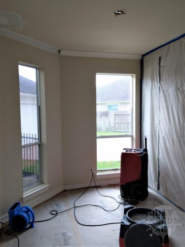 Deployed decon equipment during drywall repairs post bee hive removal: dehumidifier, HEPA air scrubber and air movers.