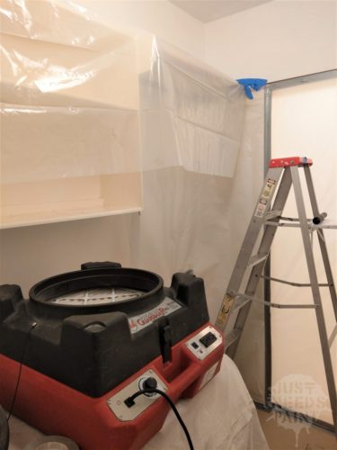 Remediation company bee removal: all surfaces are covered and HEPA air scrubbers deployed.